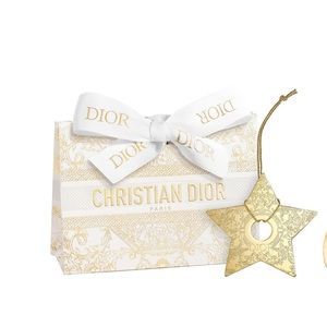 - Dior gold limited edition star/ charm/ ornament..